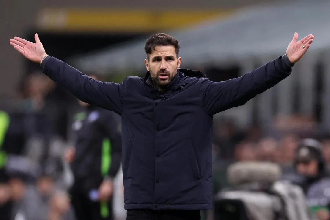 FILE PHOTO: Soccer Football - Serie A - AC Milan v Como - San Siro, Milan, Italy - March 15, 2025 Como coach Cesc Fabregas reacts REUTERS/Claudia Greco/File Photo