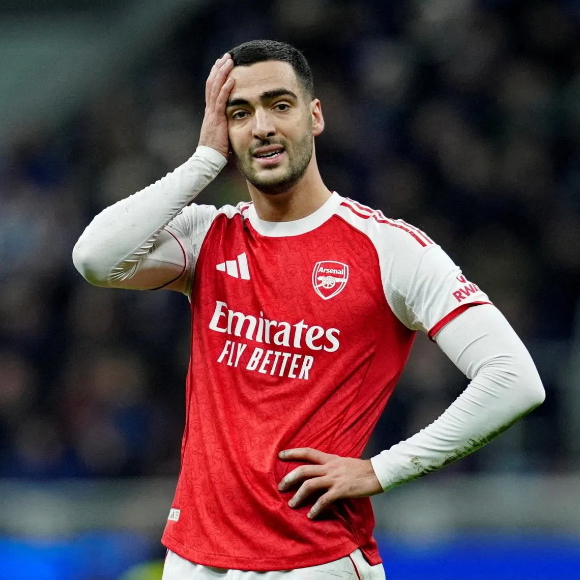 FILE PHOTO: Soccer Football - UEFA Champions League - Inter Milan v Arsenal - San Siro, Milan, Italy - January 20, 2026 Arsenal's Mikel Merino reacts REUTERS/Matteo Ciambelli/File Photo