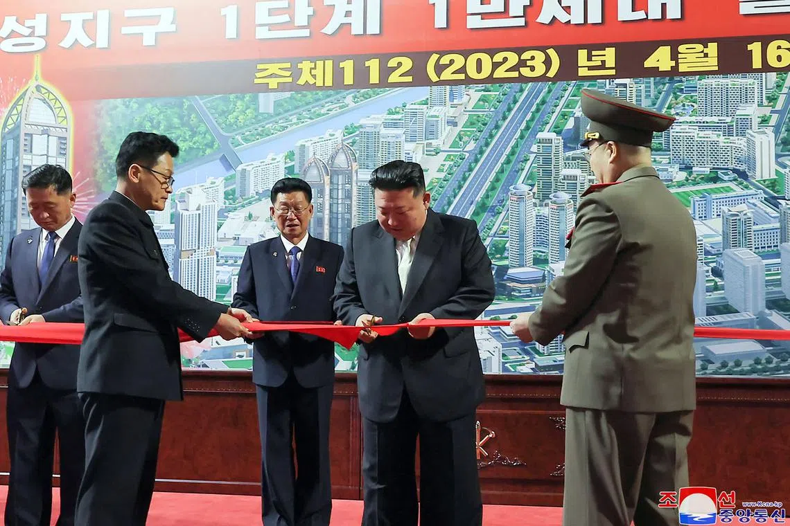 North Korean leader Kim Jong Un (centre) attending a ceremony to mark completion of the 10,000-unit housing project in Pyongyang. 