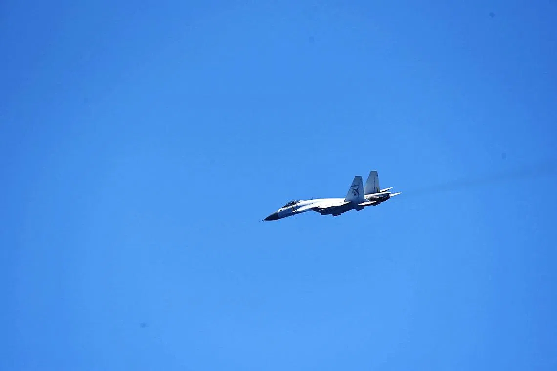 FILE PHOTO: A Chinese Shenyang J-15 fighter aircraft is seen in this handout photo released by the Joint Staff Office of the Defense Ministry of Japan April 17, 2023. Joint Staff Office of the Defense Ministry of Japan/HANDOUT via REUTERS/File Photo