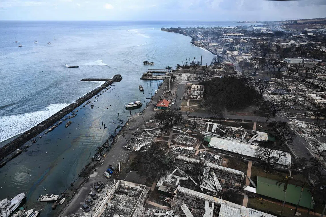 Destroyed homes and buildings are seen burned to the ground in the historic Lahaina on Aug 10, 2023. 