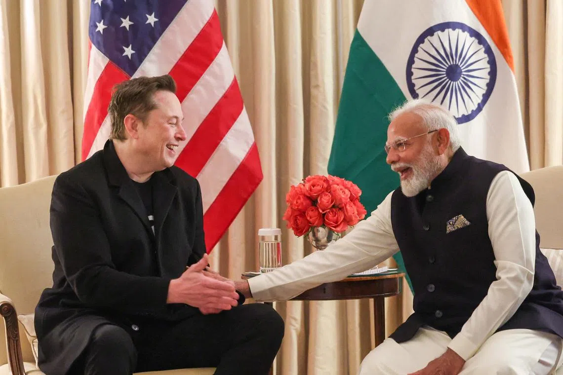 FILE PHOTO: India's Prime Minister Narendra Modi meets Elon Musk in Washington, D.C., U.S., February 13, 2025. India's Press Information Bureau/Handout via REUTERS/File Photo