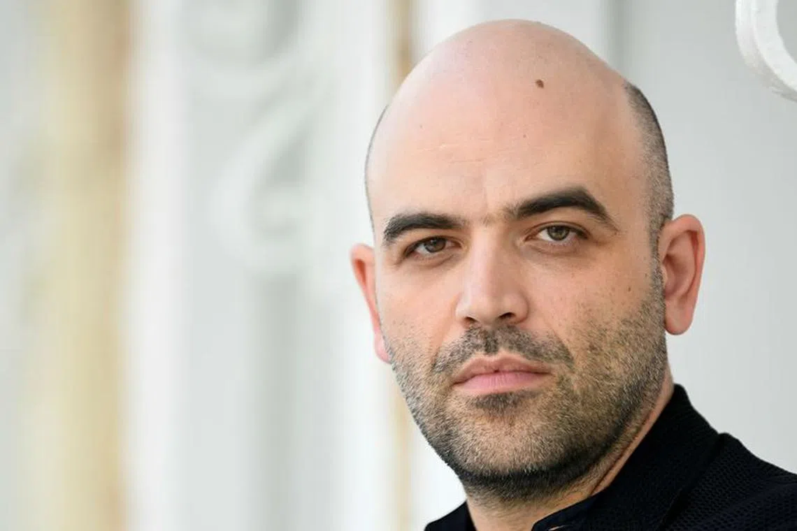 FILE PHOTO: The 76th Venice Film Festival - TV show \"Zero Zero Zero\" out of competition - Venice, Italy, September 5, 2019 - Writer Roberto Saviano poses. REUTERS/Piroschka van de Wouw/File Photo