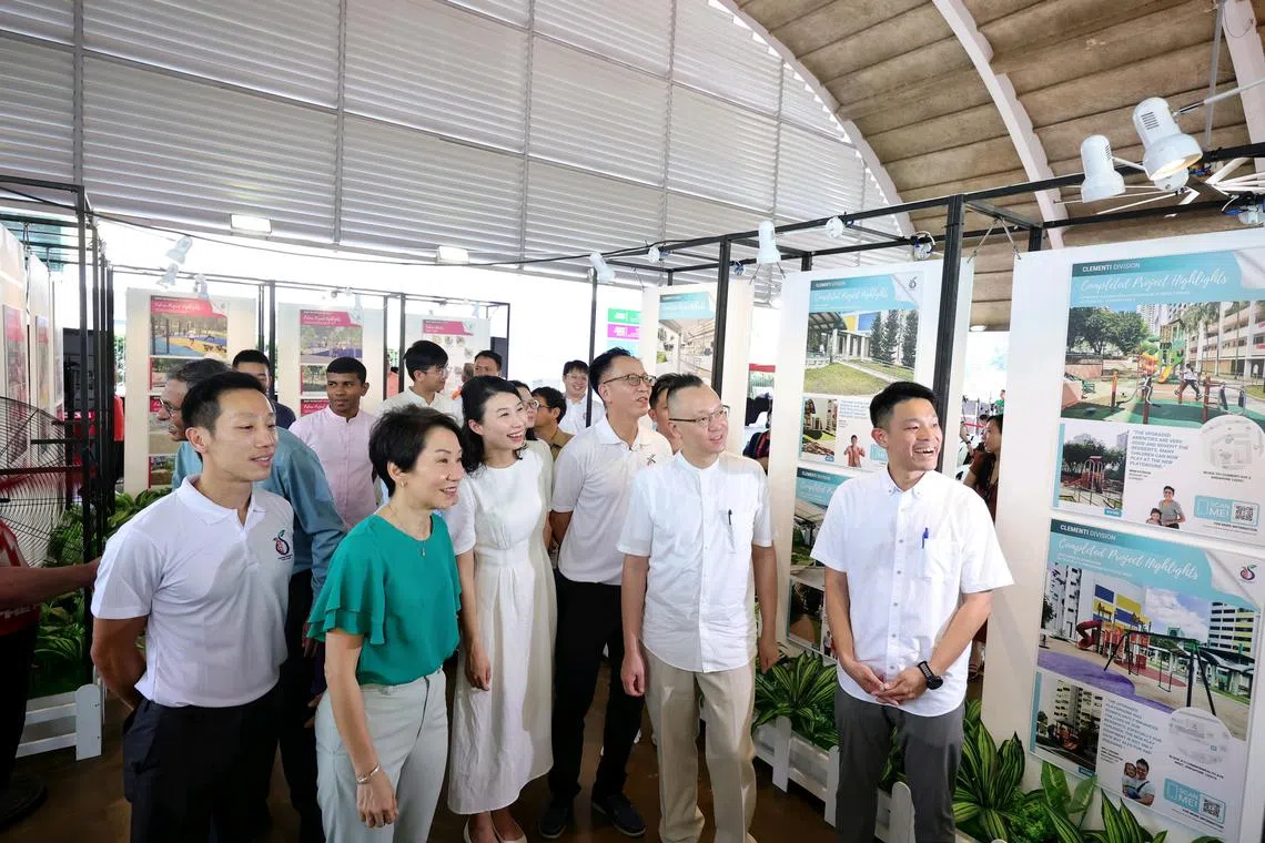 Minister for Sustainability and the Environment Grace Fu (second from left), Jurong GRC MPs Xie Yao Quan (left) and Tan Wu Meng (second from right), and Jurong-Clementi Town Council volunteers Cassandra Lee (third from left) and David Hoe (right) at the launch of the Jurong-Clementi Town Council's five-year masterplan.