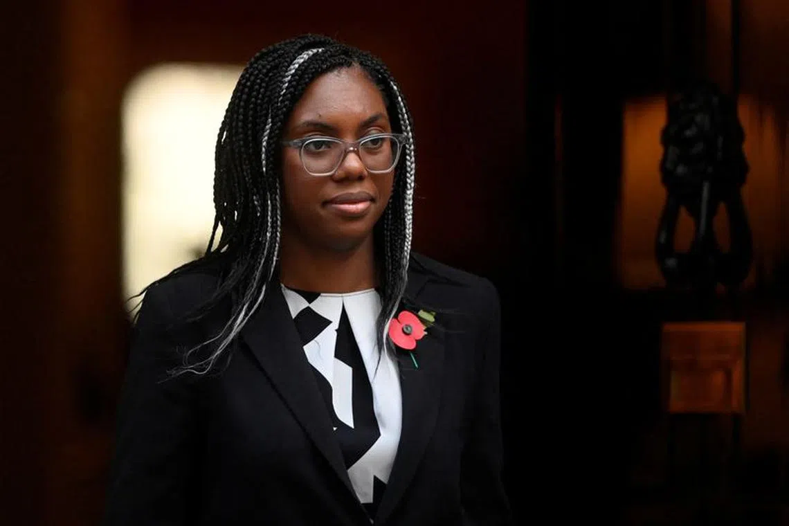 FILE PHOTO: British Secretary of State for International Trade Kemi Badenoch walks outside Number 10 Downing Street, in London, Britain November 8, 2022. REUTERS/Toby Melville/File photo