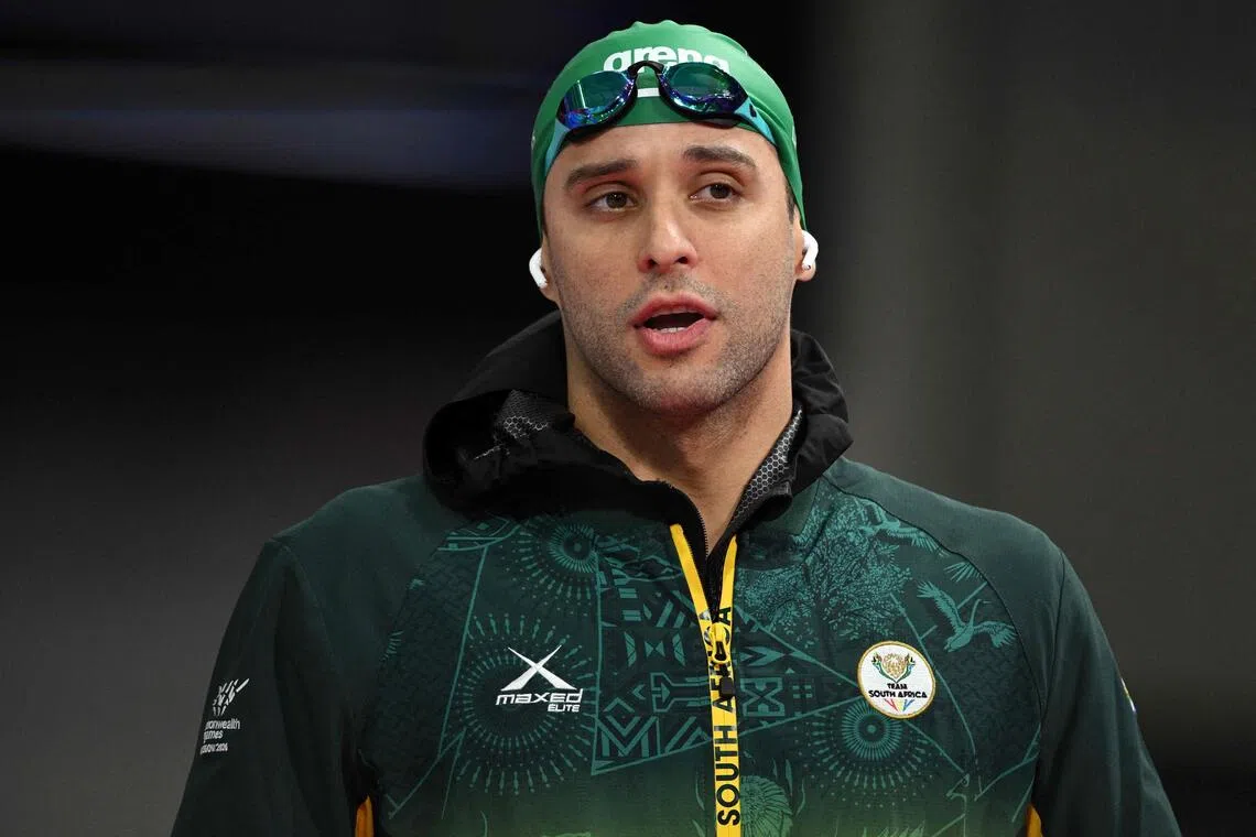 South Africa's Chad le Clos arrives for the Men's 50m Butterfly Semi-Final at the swimming event at the Tollcross International Swimming Centre in Glasgow, on day five of the Commonwealth Games in Glasgow, Scotland, on July 28, 2026. (Photo by Oli SCARFF / AFP)