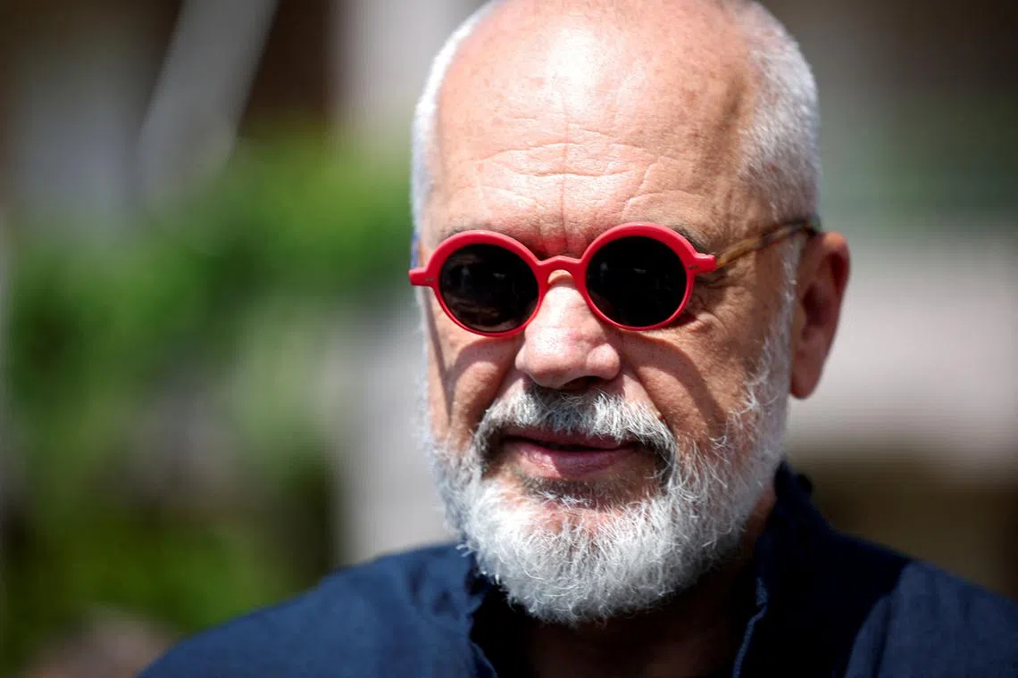 Prime Minister of Albania Edi Rama, leader of the Socialist Party, looks on after voting during parliamentary election in Tirana, Albania, May 11, 2025. REUTERS/Florion Goga