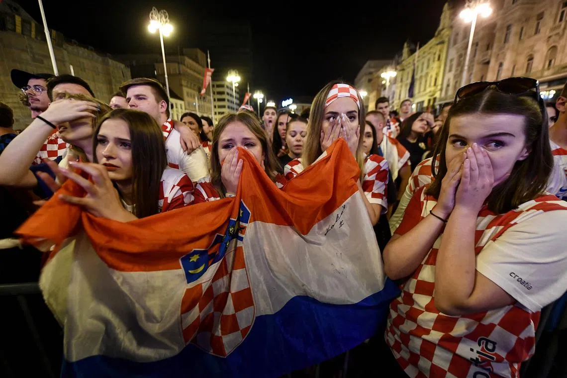 Croatian fans react as they watch the UEFA Nations League football final match between Croatia and Spain, in Zagreb, on June 18, 2023. Spain won the Nations League with a 5-4 shoot-out victory over Croatia, after the match finished 0-0 after extra-time. 