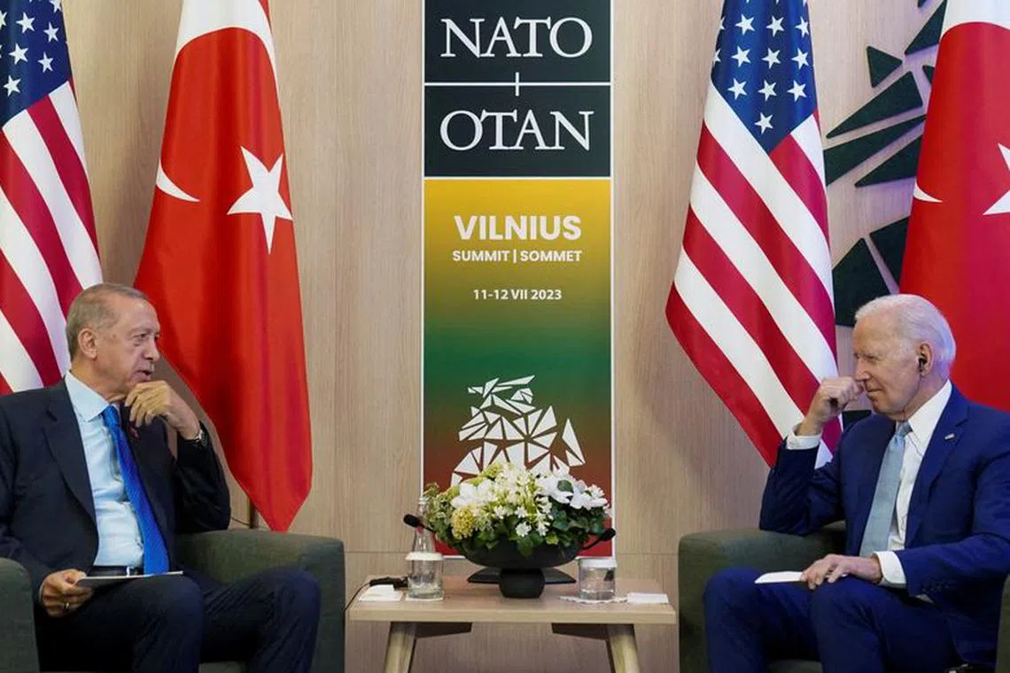 FILE PHOTO: U.S. President Joe Biden meets with Turkish President Tayyip Erdogan at the NATO summit in Vilnius, Lithuania, July 11, 2023. REUTERS/Kevin Lamarque/File Photo