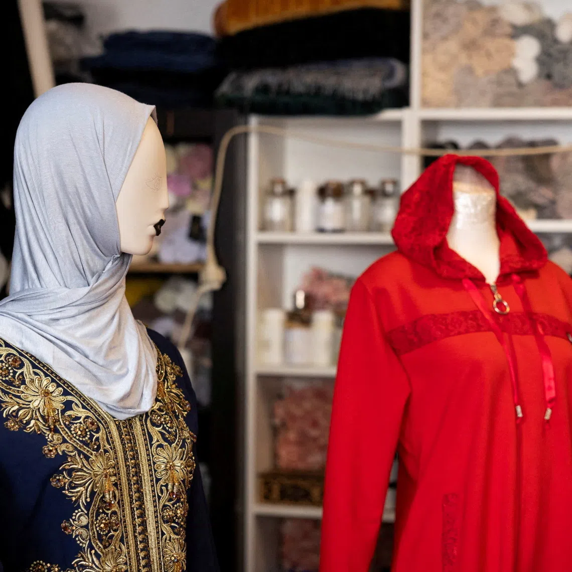 A mannequin dressed in a headscarf is on display in a shop in Vienna, Austria, September 7, 2026. REUTERS/Lisa Leutner