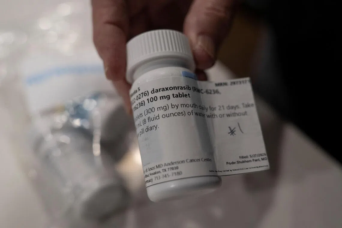 Menta “Steve” Wallace shows a bottle of daraxonrasib, Revolution MedicineÕs pancreatic cancer drug.