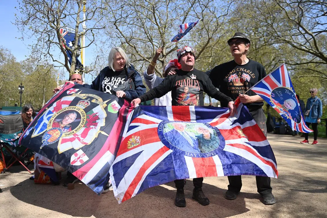 Royal fans wait on the coronation procession route on The Mall in London, Britain, May 3, 2023. Britain's King Charles III's coronation will take place at Westminster Abbey in London on May 6, 2023. 