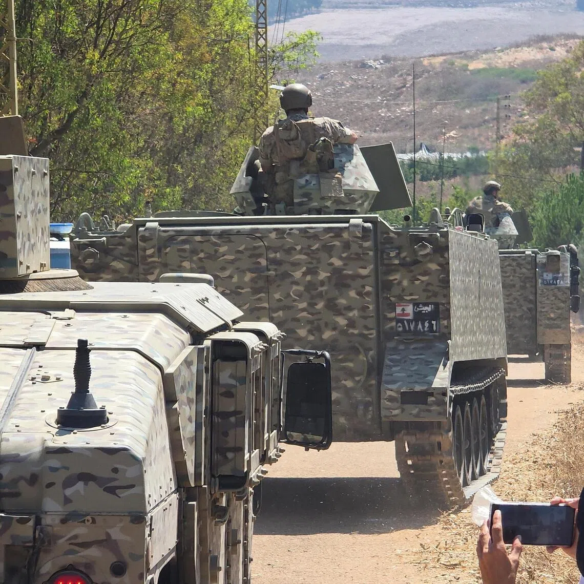 Lebanese army troops deployed at the entrance of the town of Zawtar al-Gharbiyeh after Israeli forces withdrew from the area on July 21.