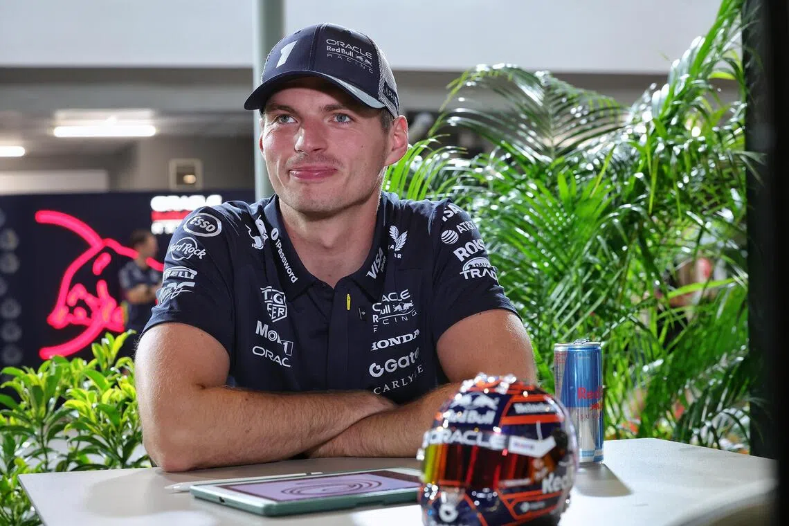 [NOTE: F1 photos are for editorial use only and NOT for sale] Oracle Red Bull Racing driver Max Verstappen (#1) Max Verstappen of the Netherlands speaking to The Straits Times in the Red Bull hospitality suite at the F1 Paddock on Oct 2, 2025.