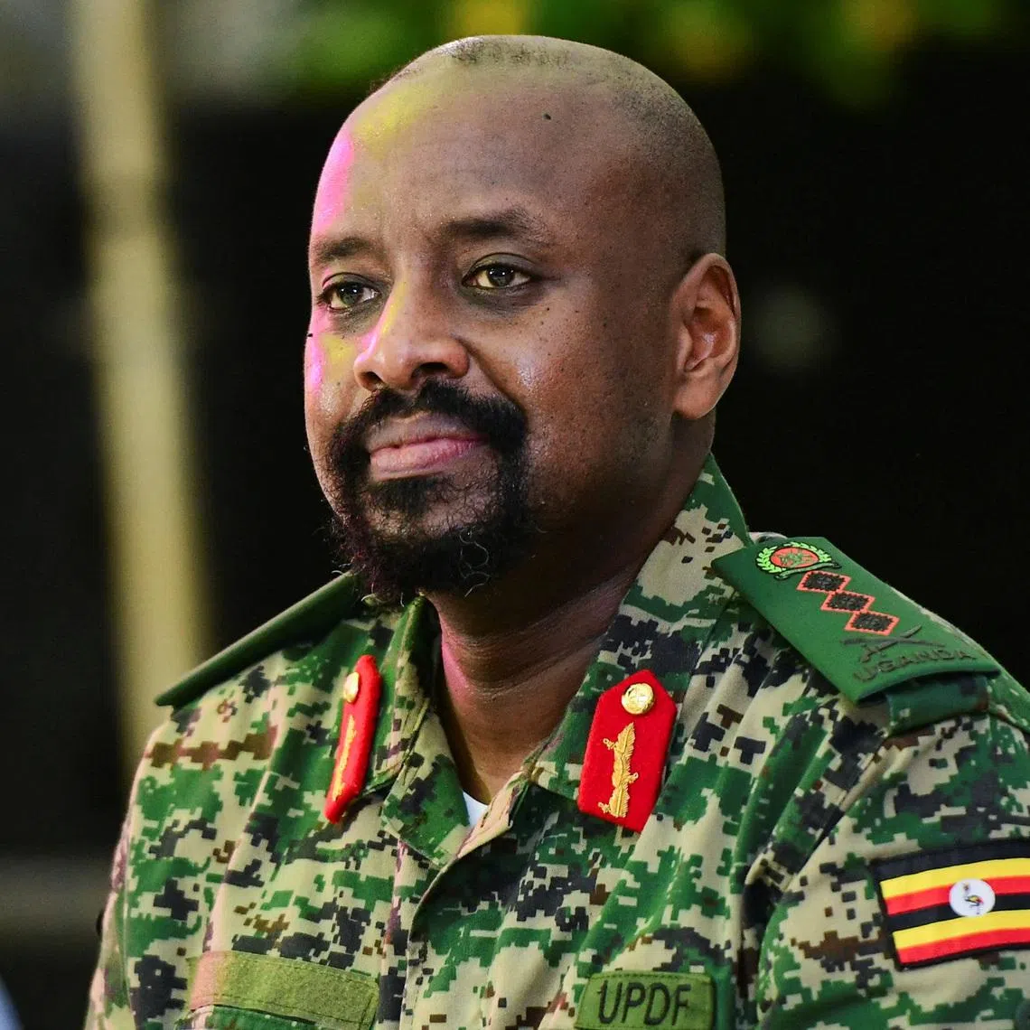 FILE PHOTO: Muhoozi Kainerugaba of the Uganda People's Defence Force (UPDF), the son of Uganda's President Yoweri Museveni, who leads the Ugandan army's land forces, looks on during his birthday party in Entebbe, Uganda May 7, 2022. REUTERS/Abubaker Lubowa/File Photo