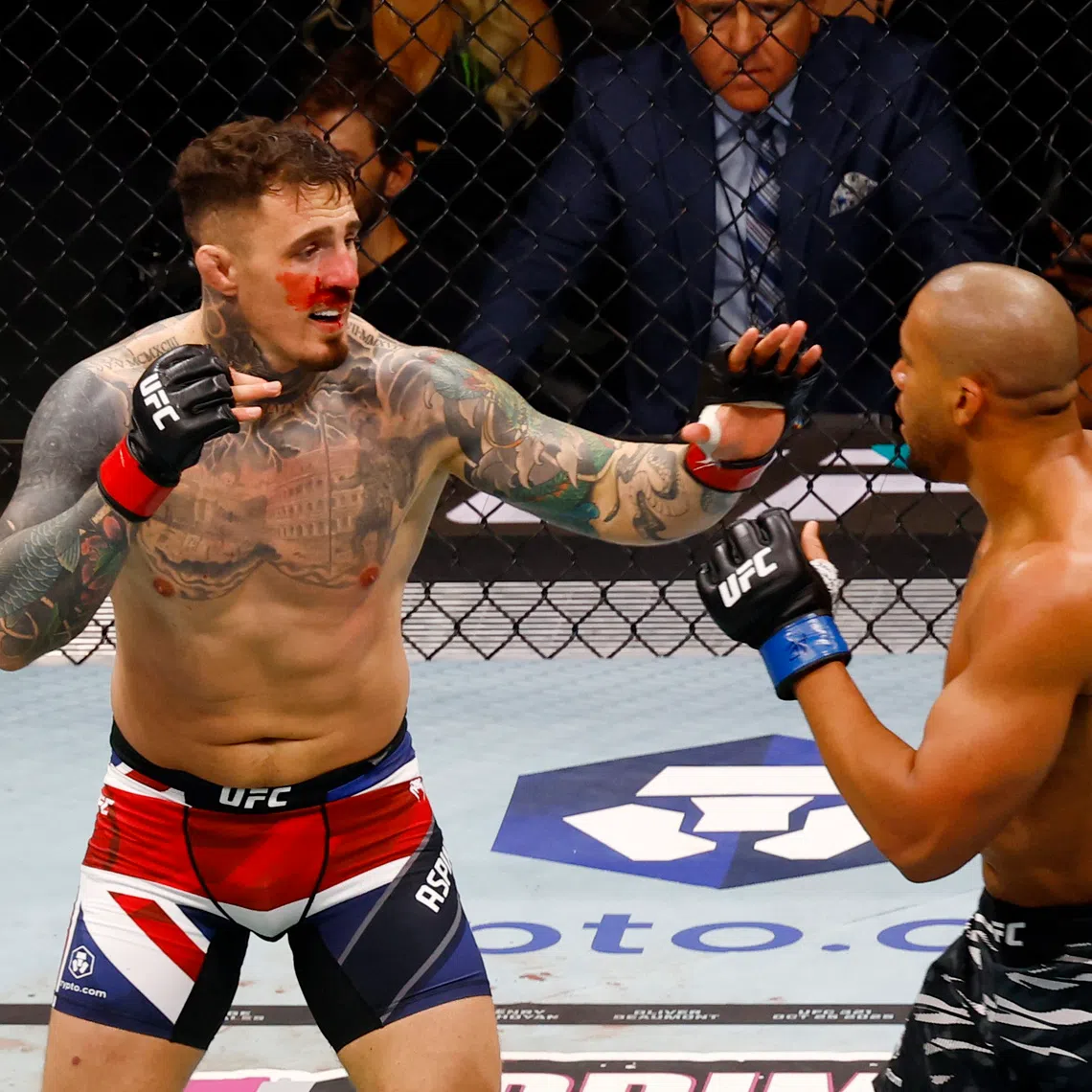 Tom Aspinall's (left) heavyweight title defence fight against Ciryl Gane ended in a no-contest after Gane accidentally poked both of Aspinall’s eyes.