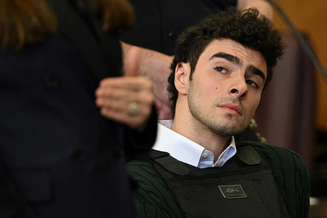 FILE PHOTO: Luigi Mangione, the suspect in the killing of UnitedHealth Group chief executive Brian Thompson, appears in Manhattan Supreme Court on New York state murder and terrorism charges in New York City, U.S., February 21, 2025. Curtis Means/Pool via REUTERS/File Photo