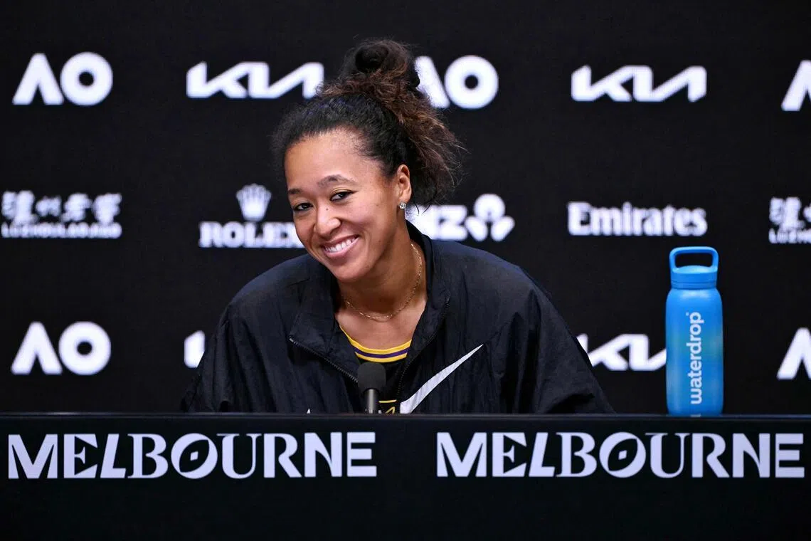 TOPSHOT - Japan's Naomi Osaka attends a press conference after winning her women's singles match against Romania's Sorana Cirstea on day five of the Australian Open tennis tournament in Melbourne on January 22, 2026. (Photo by WILLIAM WEST / AFP) / -- IMAGE RESTRICTED TO EDITORIAL USE - STRICTLY NO COMMERCIAL USE --