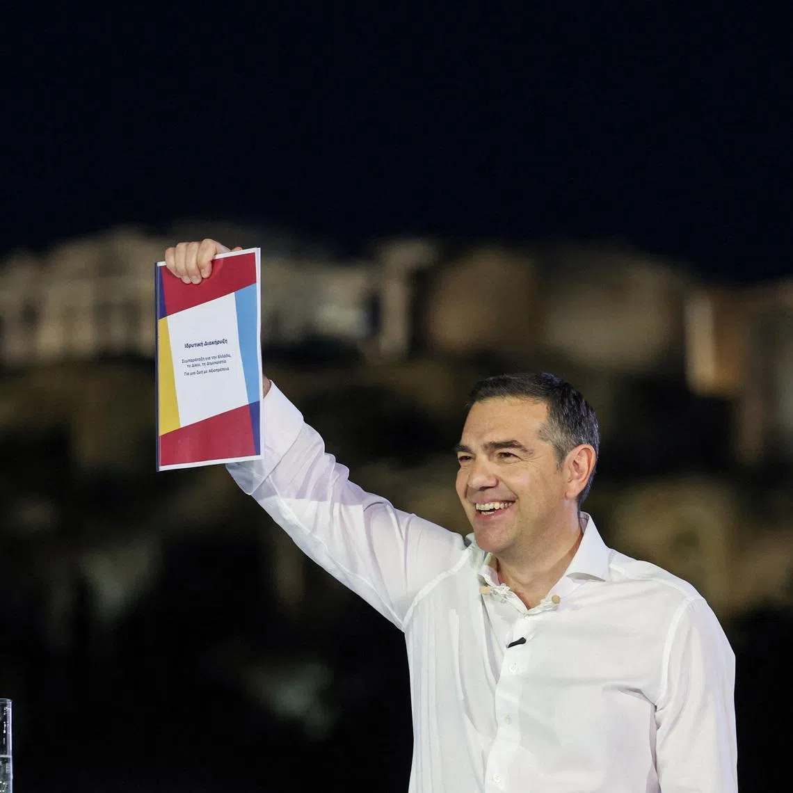 Greece's former Prime Minister Alexis Tsipras holds the founding declaration, during the official announcement of his new political party, ELAS-Greek Left Alliance, ahead of the 2027 parliamentary elections, in Athens, Greece, May 26, 2026. REUTERS/Louisa Gouliamaki