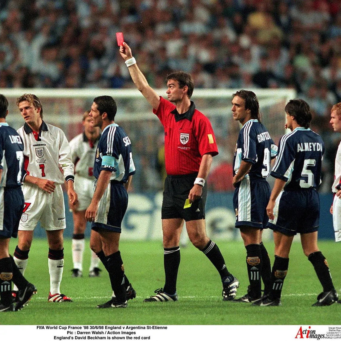 FILE PHOTO: Football - 1998 FIFA World Cup - Second Round - England v Argentina - Stade Geoffroy Guichard, Saint Etienne - 30/6/98   Pic : Darren Walsh / Action Images    England's David Beckham is shown the red card/File Photo