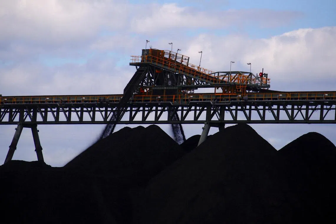 FILE PHOTO: Coal is unloaded onto large piles at the Ulan Coal mines near the central New South Wales rural town of Mudgee in Australia, March 8, 2018. REUTERS/David Gray/File Photo