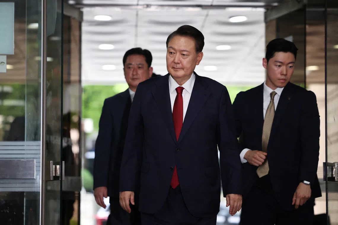 Former South Korean President Yoon Suk Yeol arrives at a court to attend a hearing to review his arrest warrant requested by special prosecutors in Seoul, South Korea, July 9, 2025.   REUTERS/Kim Hong-Ji/Pool