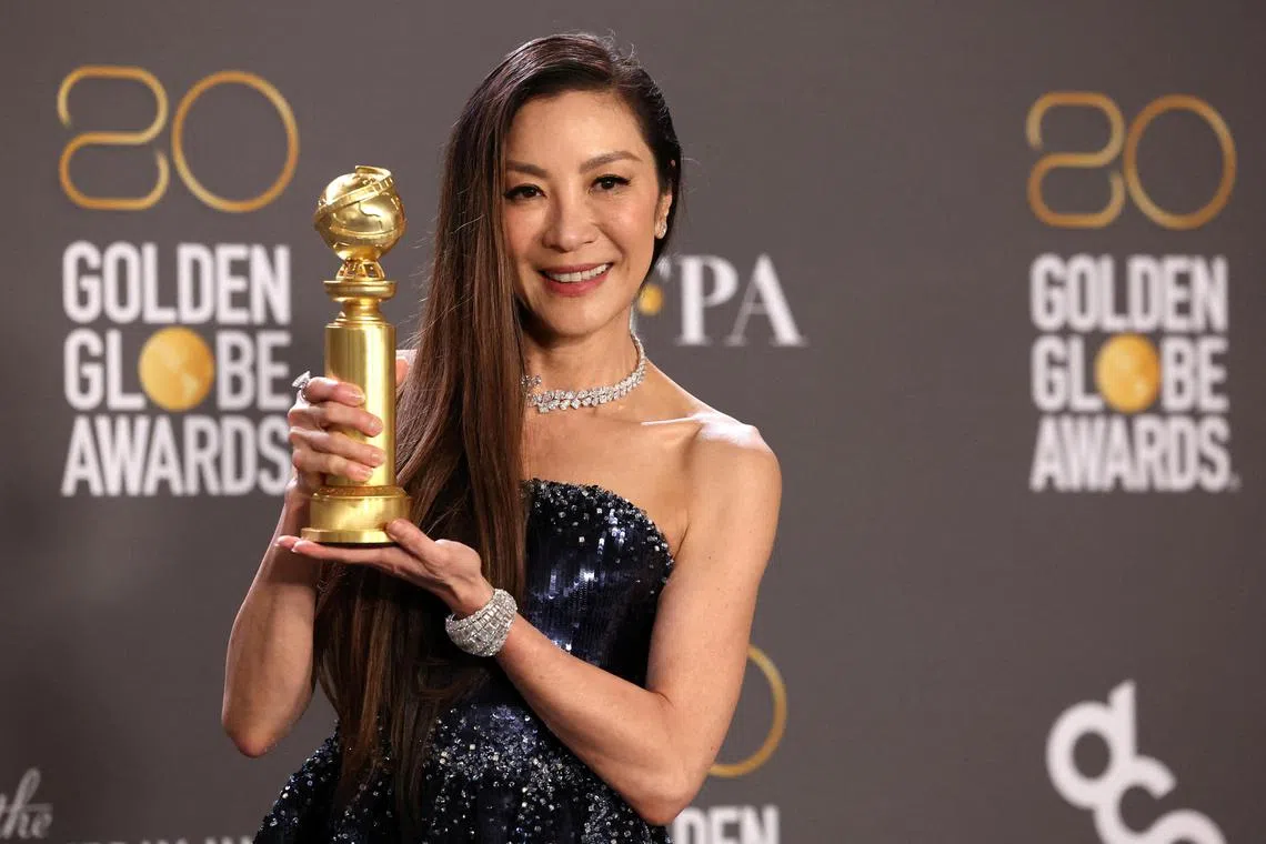 FILE PHOTO: Michelle Yeoh poses with her award for Best Actress in a Musical or Comedy Motion Picture for "Everything Everywhere All at Once"  at the 80th Annual Golden Globe Awards in Beverly Hills, California, U.S., January 10, 2023. REUTERS/Mario Anzuoni/File Photo