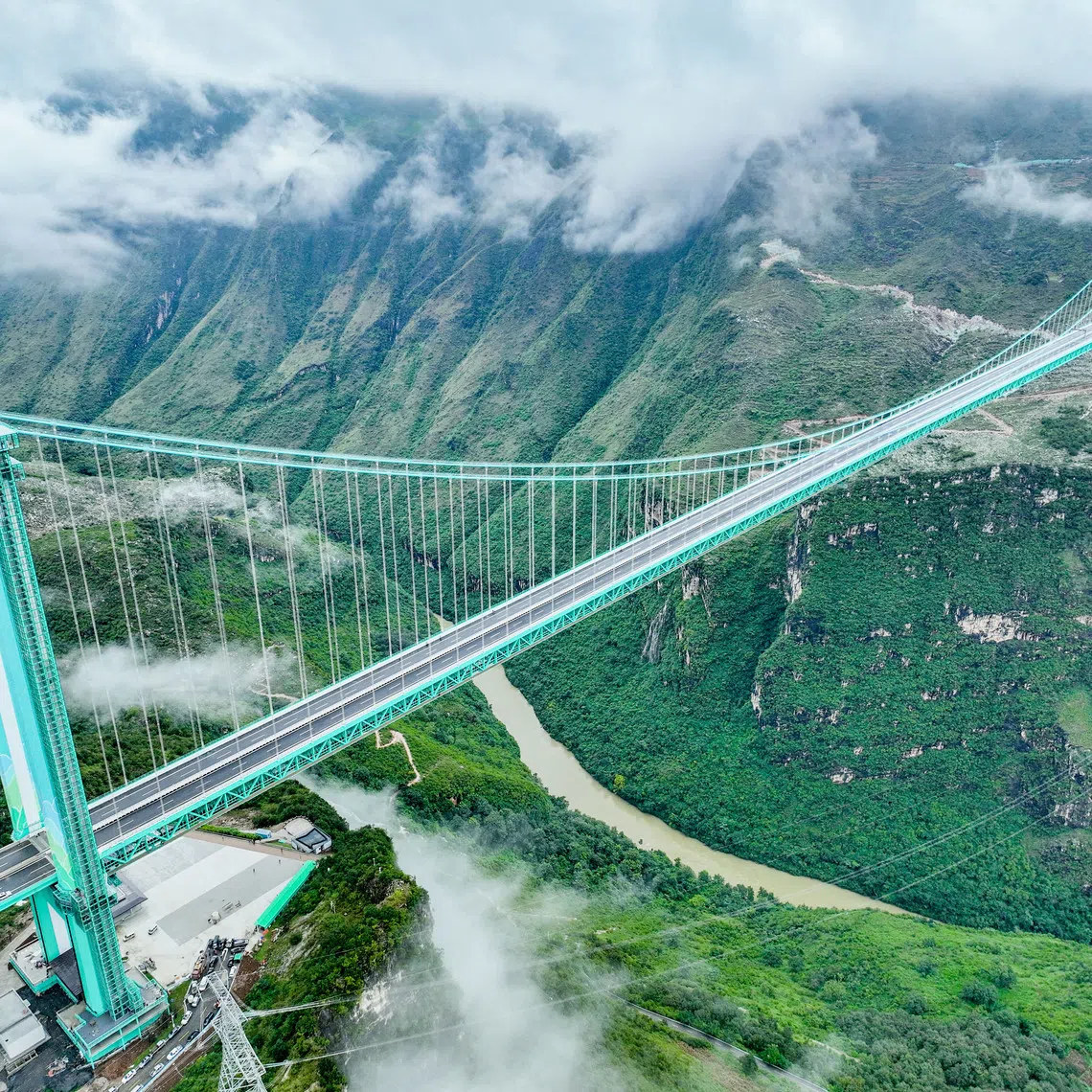 The Huajiang Grand Canyon Bridge towers 625m above a river and vast gorge in the country’s rugged southern province of Guizhou.