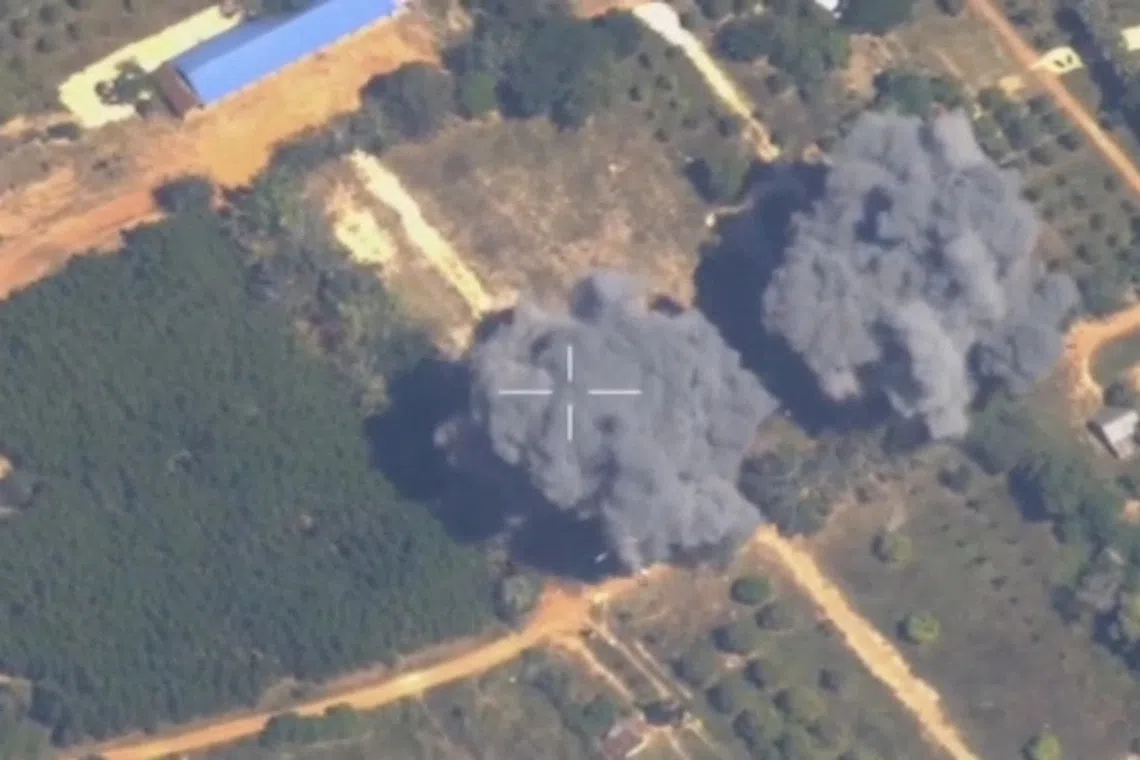FILE PHOTO: Footage shows smoke rising following what Thailand said was airstrikes carried out in Cambodia along a disputed border area, in Preah Netr Preah, Banteay Meanchey Province, Cambodia, in this screen grab taken from a handout video released on December 15, 2025. Royal Thai Army/Handout via REUTERS