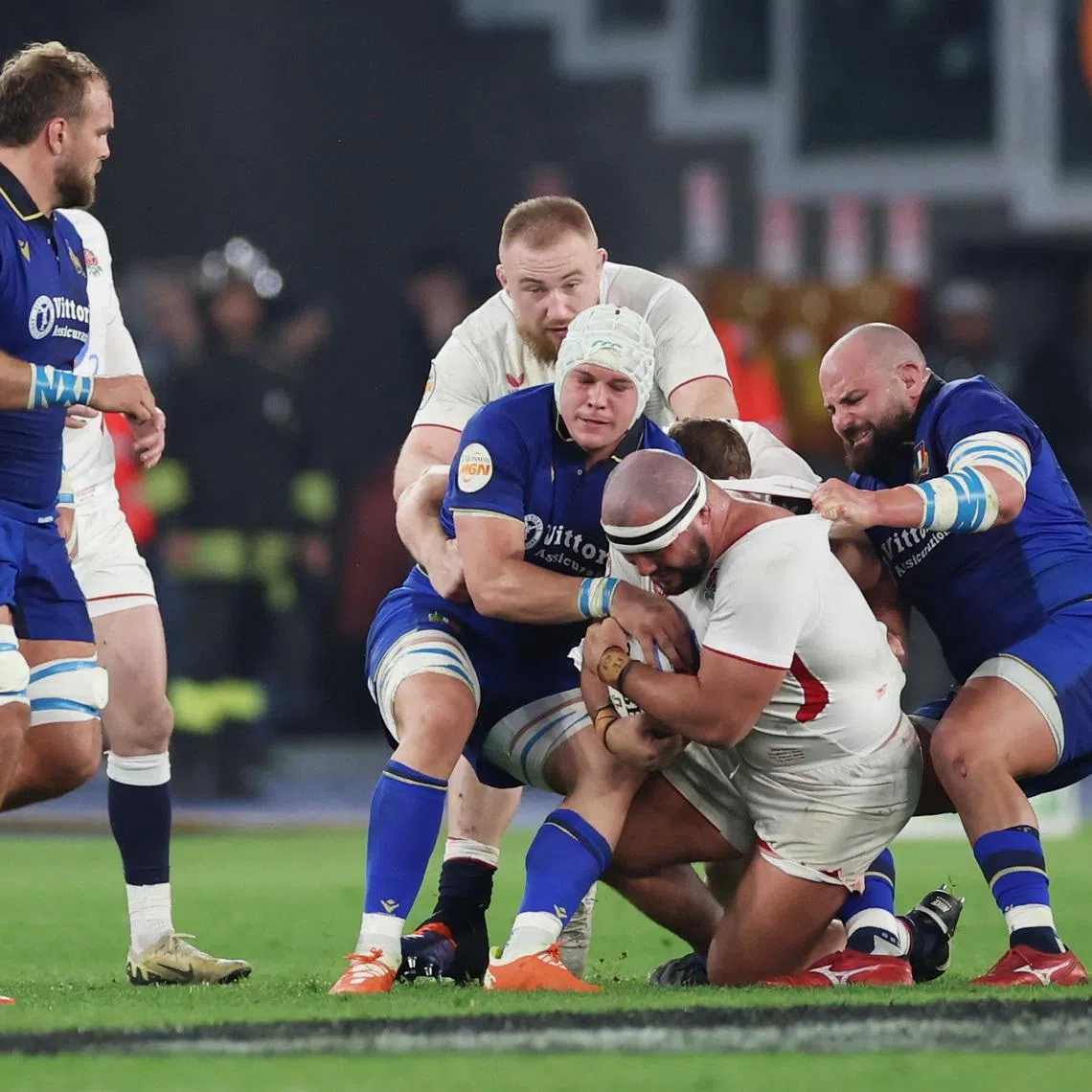 FILE PHOTO: Rugby Union - Six Nations Championship - Italy v England - Stadio Olimpico, Rome, Italy - March 7, 2026 Italy's Simone Ferrari and Manuel Zuliani in action with England's Ellis Genge REUTERS/Ciro De Luca/ File Photo
