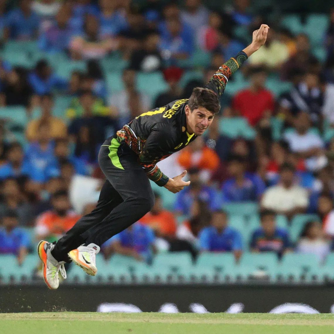 FILE PHOTO: Cricket - Second Twenty20 International - Australia v India - Sydney Cricket Ground, Sydney, Australia - December 6, 2020 Australia's Moises Henriques in action REUTERS/Loren Elliott/ File photo