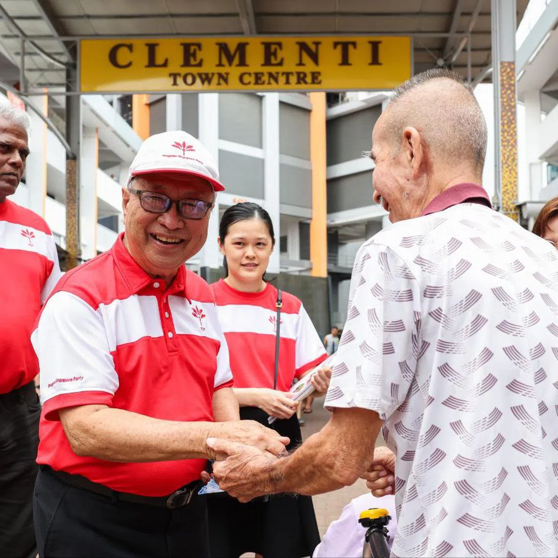 Progress Singapore Party chairman Tan Cheng Bock (second from left) greeting Clementi residents during his party's walkabout at Clementi Central on Feb 23.