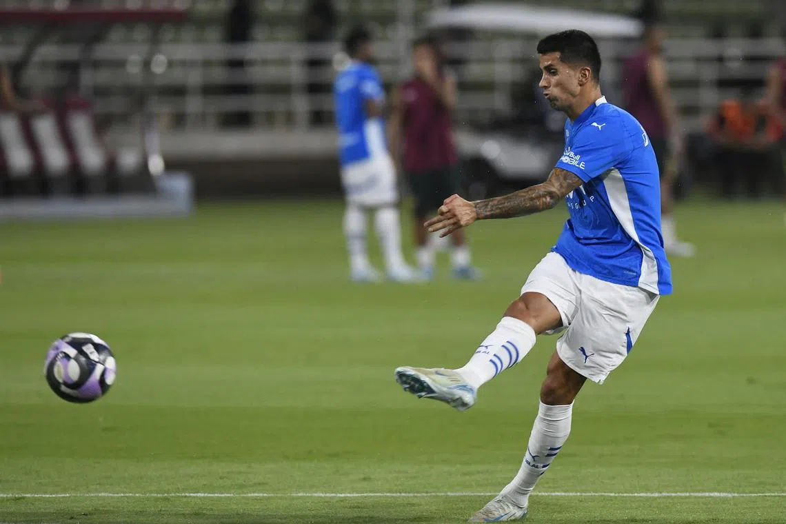 Soccer Football - Saudi Pro League - Al Kholood v Al Hilal - King Abdullah Sport City Stadium, Buraidah, Saudi Arabia - September 28, 2024 Al Hillal's Joao Cancelo during the warm up before the match REUTERS/Stringer