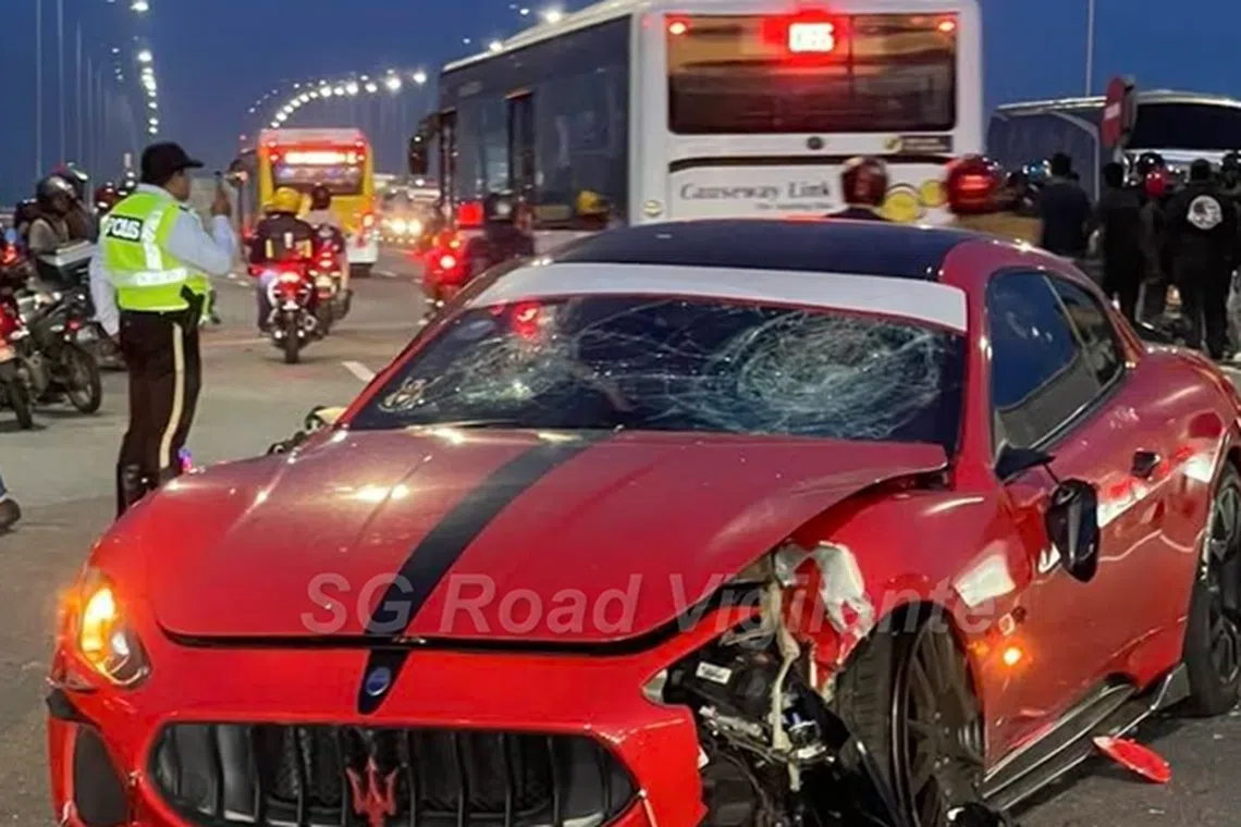 The car can be seen with a shattered windscreen and a damaged bonnet.