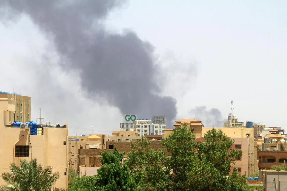 Smoke billowing as fighting between the army and paramilitary forces led by rival generals rages on in Khartoum, on April 20, 2023.
