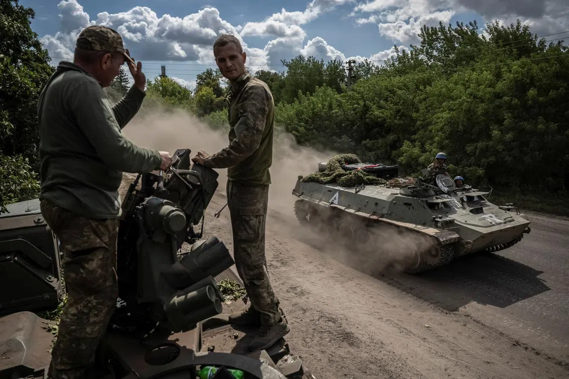 Ukrainian service members ride an Armoured Personnel Carrier, amid Russia's attack on Ukraine, near the Russian border in Sumy region, Ukraine August 11, 2024. REUTERS/Viacheslav Ratynskyi