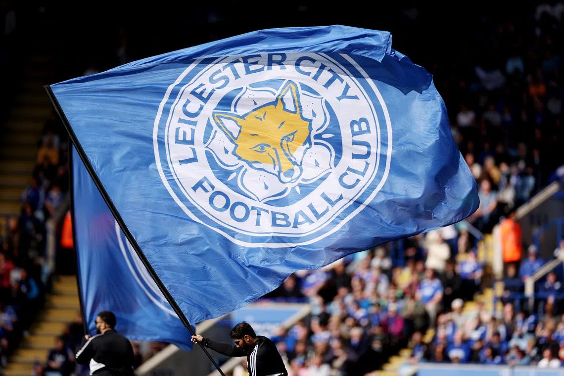 Soccer Football - Premier League - Leicester City v AFC Bournemouth - King Power Stadium, Leicester, Britain - April 8, 2023 A Leicester City fan waves a flag inside the stadium before the match REUTERS/Ian Walton/File Photo