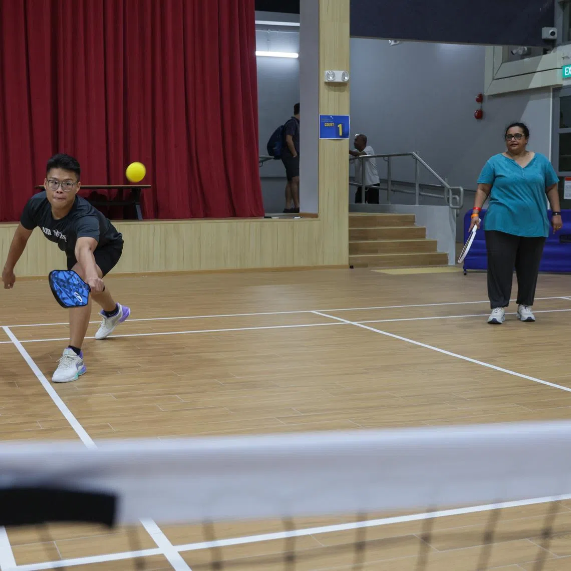 Mr Isaac Teo (left) and Ms Aarti Naidu participating at the “Silent Pickleball” Try-Out held in Mountbatten CC on Jan 11.