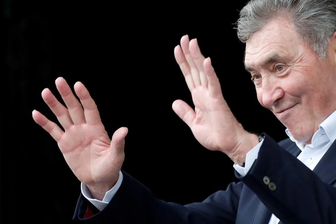FILE PHOTO: Cycling - Tour de France - The 194.5-km Stage 1 from Brussels to Brussels - July 6, 2019 - Former cycling champion Eddy Merckx waves on the podium. REUTERS/Christian Hartmann/File Photo