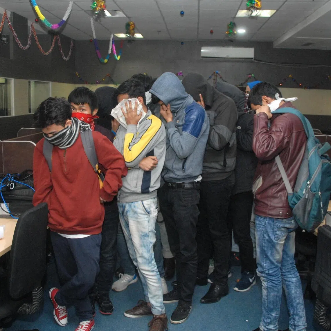Suspected scammers caught at a call centre in Noida in India's northern state of Uttar Pradesh in 2018