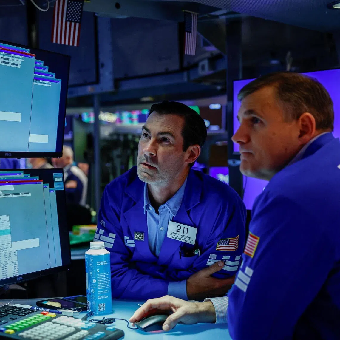 Traders working on the floor of the New York Stock Exchange in New York City, on Sept 16.