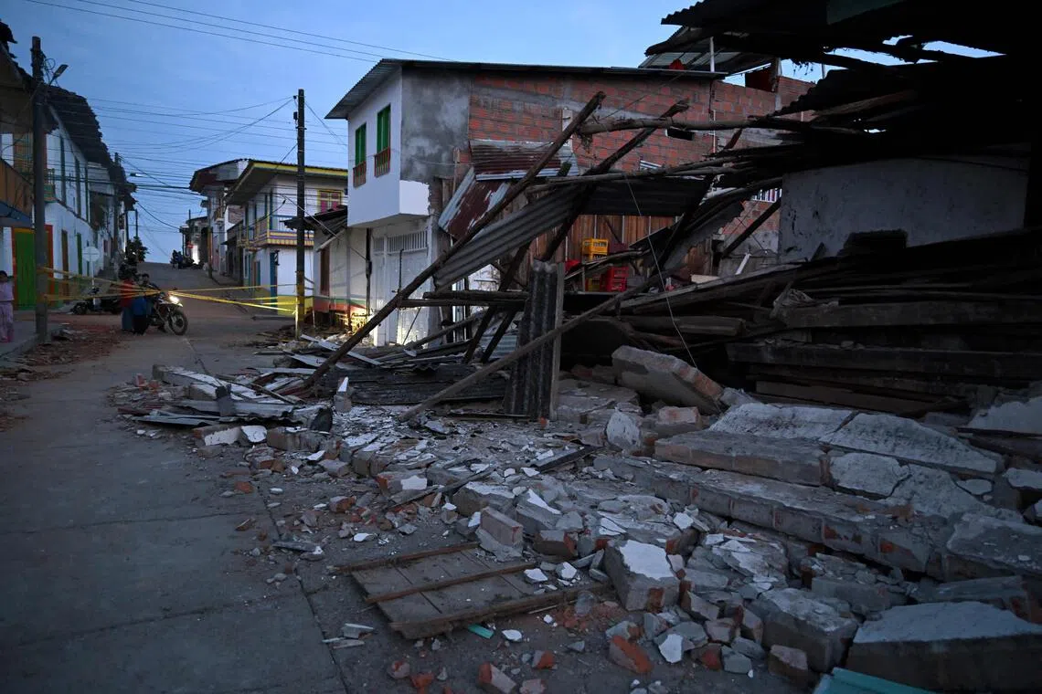 Rescuers, soldiers and volunteers searched through collapsed apartment blocks and office buildings across western Colombia, racing to find survivors.