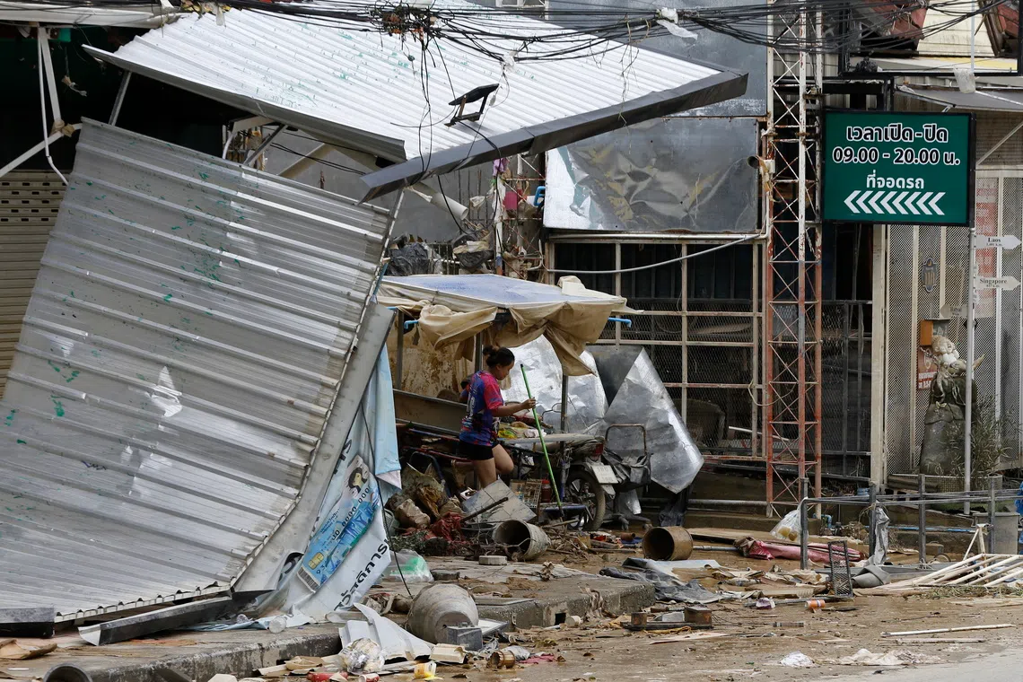 Thailand, Indonesia and Malaysia begin clean-up after massive floods kill hundreds