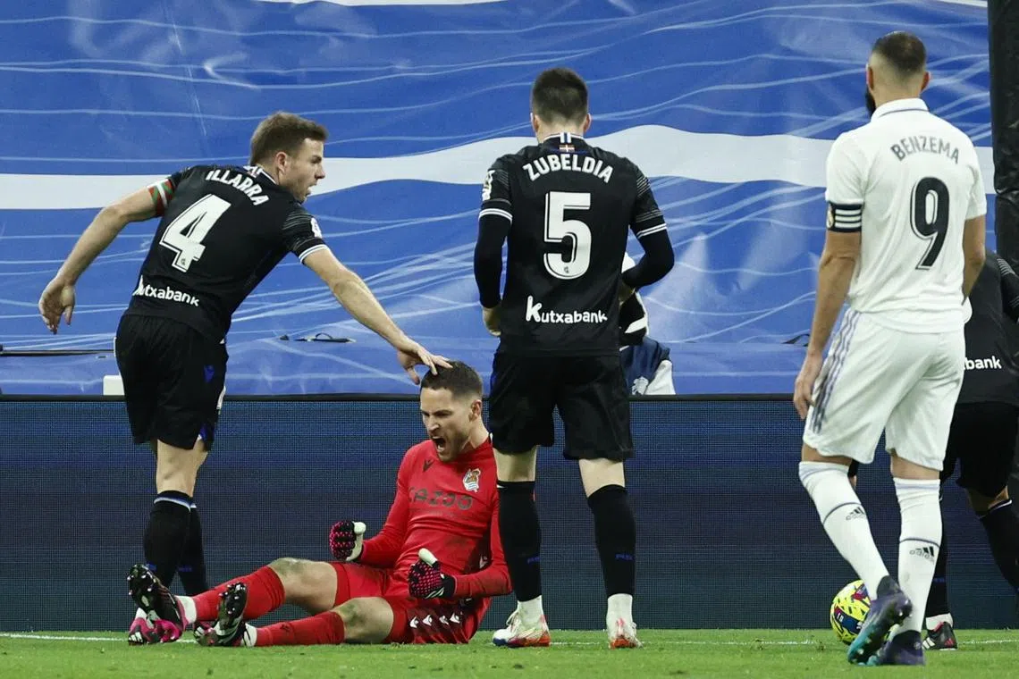 Real Sociedad goalkeeper Alex Remiro pumped up after making a save in his side's clash with Real Madrid on Sunday. Both sides had to settle for a goalless draw thanks mainly to Remiro's heroics.