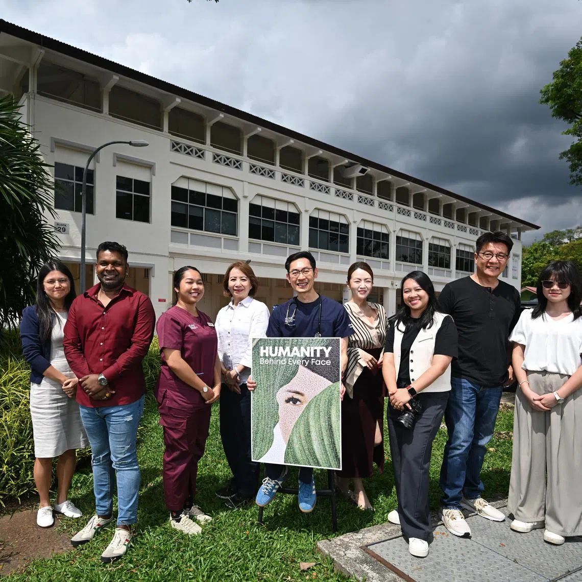 [EMBARGOED TILL 7 DEC, 2024 FOR ONLINE]
ST20241122-202454300672-Lim Yaohui-Chin Soo Fang-sfhumanity07/
(From left) Ms Ashley Nguyen, 39, Corporate Planning Manager, Alexandra Hospital; Mr Kesavan, 33, Associate Executive, ALPS Healthcare; Ms Aishah Elshukrin, 27, Senior Social Work Coordinator, Alexandra Hospital; Ms Serene Poh, 65, Senior Project Specialist, Office of Campus Planning, Alexandra Hospital; Associate Professor Khoo See Meng, 55, Chairman, Medical Board, Alexandra Hospital; Ms Yvonne Lee, 38, Writer of Humanity and Communications Manager, Alexandra Hospital; Ms Sheereen Yeo, 34, Photographer of Humanity and Senior Assistant Communications Manager, Alexandra Hospital; Mr Joe Khoo, 55, Art Director of Humanity and Senior Communications Manager, Alexandra Hospital; Ms Chloe Tan, 20, Writer of Humanity and Communications Intern, Alexandra Hospital; in front of Alexandra Hospital on Nov 22, 2024.
Alexandra Hospital (AH) is launching a book on 3 Dec 2024 - “Humanity: Behind Every Face”. These are 50 back stories of AH staff on their personal lives, struggles, hope, courage etc. Part of the proceeds go to AH’s Patient Welfare Fund.
(ST PHOTO: LIM YAOHUI)