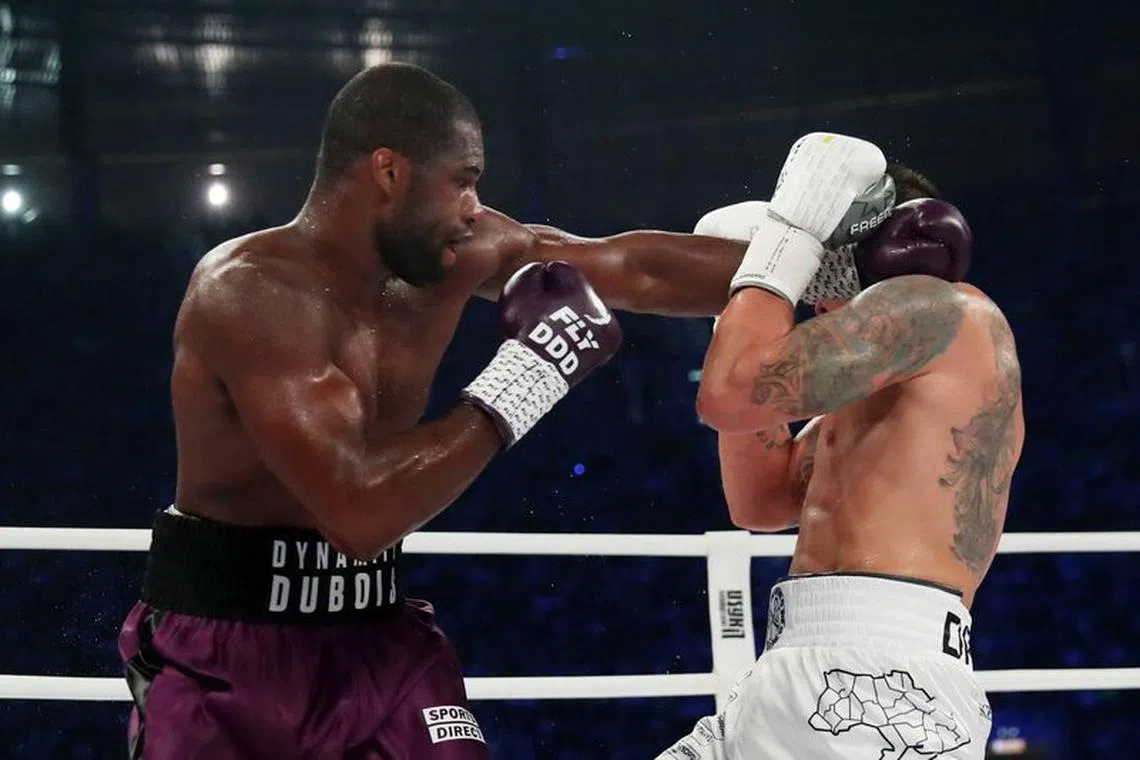FILE PHOTO-Boxing - WBA, IBF & WBO Heavyweight Titles - Oleksandr Usyk v Daniel Dubois - Tarczynski Arena, Wroclaw, Poland - August 26, 2023  Oleksandr Usyk in action during his fight against Daniel Dubois REUTERS/Kacper Pempel/File Photo