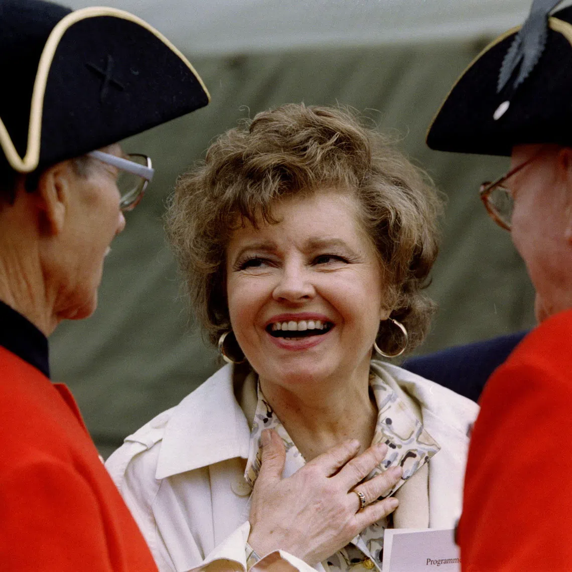 Actress Prunella Scales (centre, at a tea party event in Britain) was diagnosed with vascular dementia in 2013, but continued to work for several years.