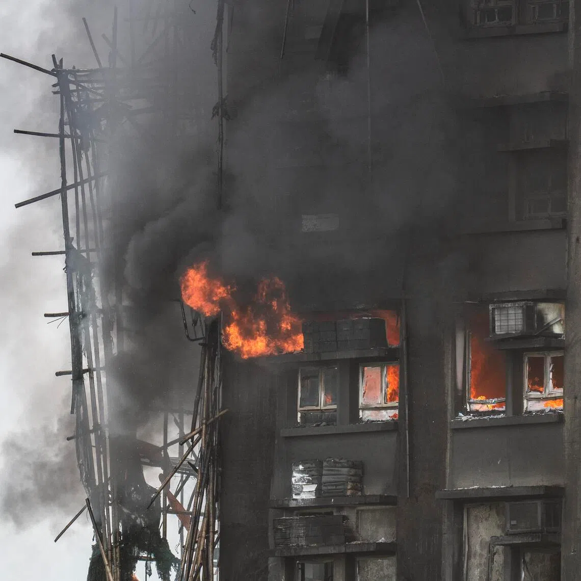Residences still burning in the Wang Fuk Court complex, in the Tai Po district of Hong Kong, on Nov 27.