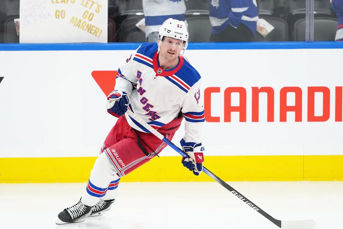 FILE PHOTO: Oct 19, 2024; Toronto, Ontario, CAN; New York Rangers left wing Alexis Lafreniere (13) skates during the warmup before a game against the Toronto Maple Leafs at Scotiabank Arena. Mandatory Credit: Nick Turchiaro-Imagn Images/File Photo