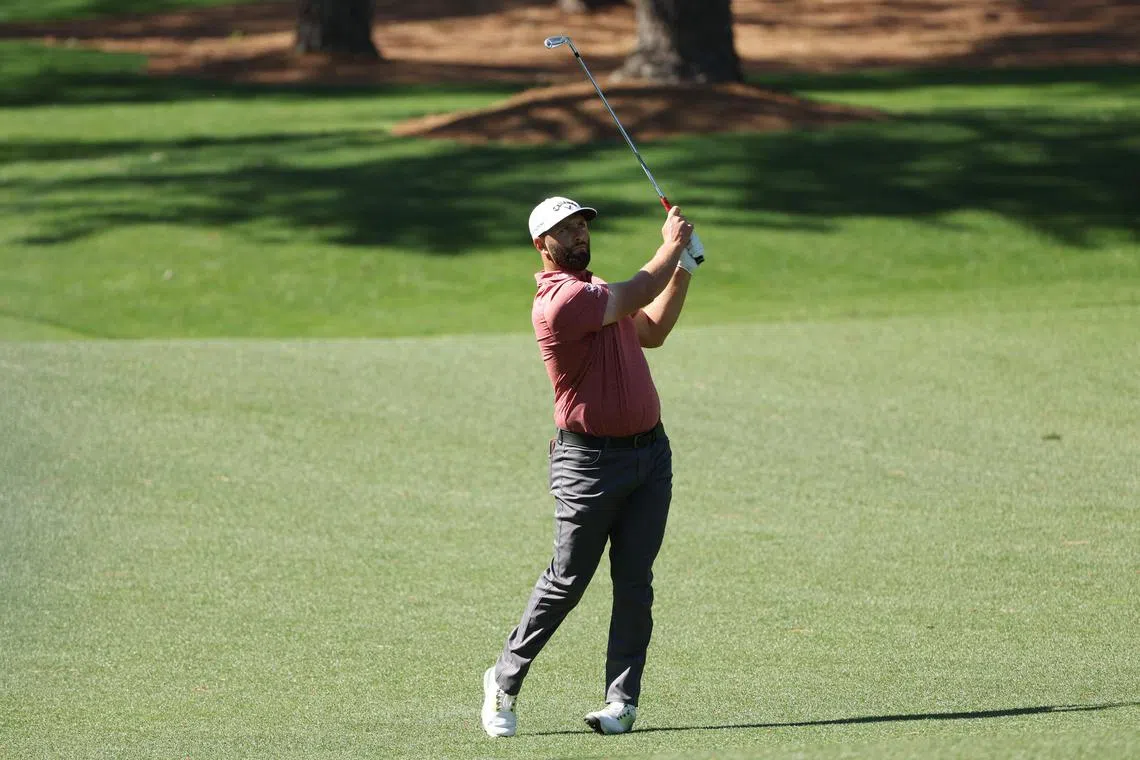 Jon Rahm plays a shot on the seventh hole during the final round of the 2023 Masters Tournament.